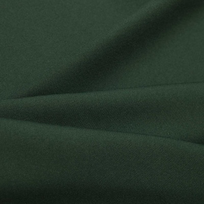Ткань костюмная 21010 2076, 225 гр/м2, шир.150см, цвет т.зеленый - купить в Чебоксарах. Цена 390.73 руб.